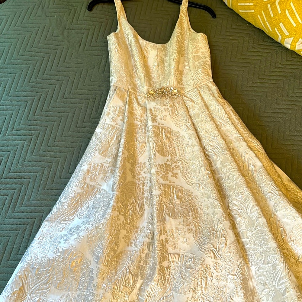 High low champagne formal gown that is absolutely stunning on!